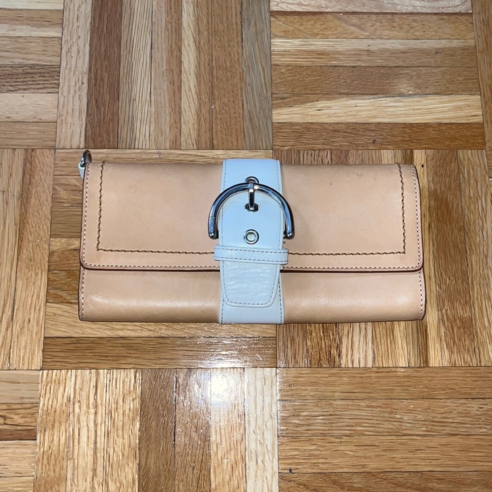 Coach brown leather wallet with front buckle